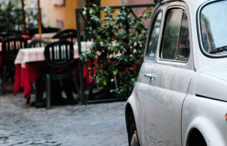 Spring vacation tips for Tuscany Typical town center in Tuscany with a Fiat 500