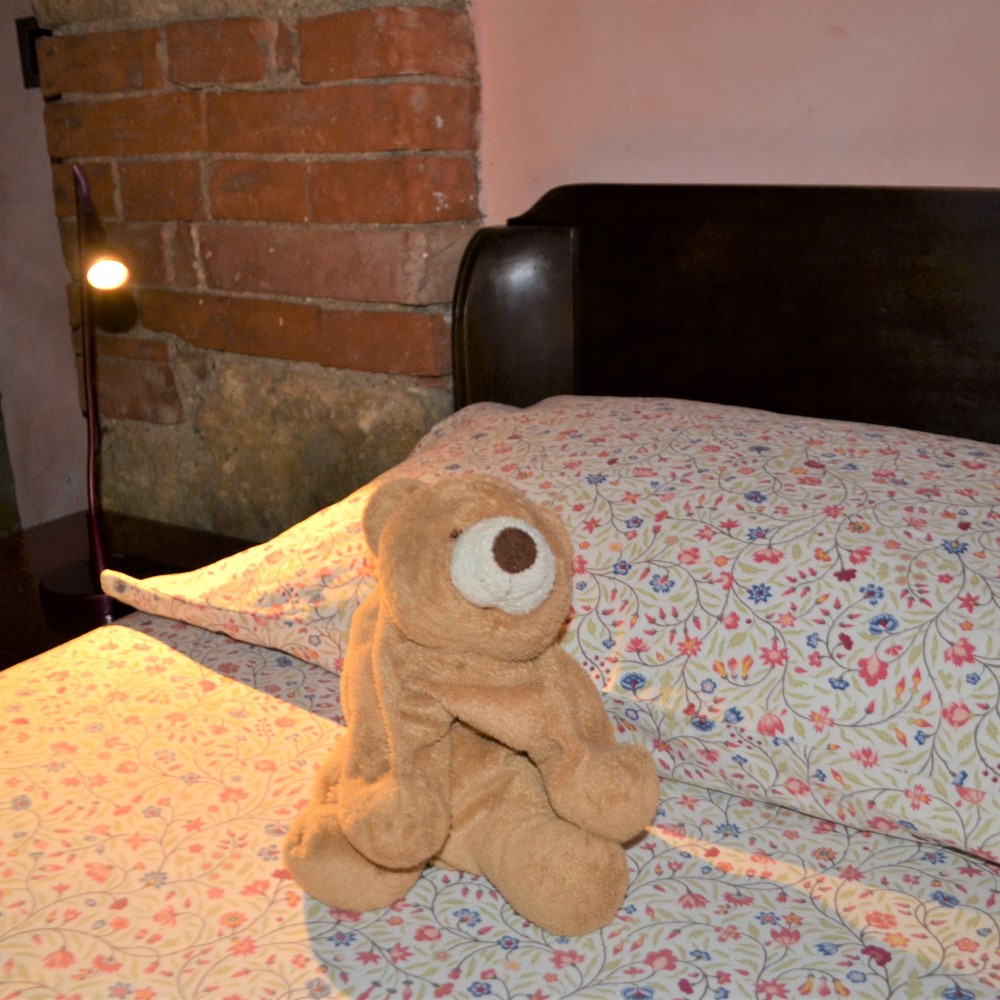Bed in the rural holiday home in Tuscany